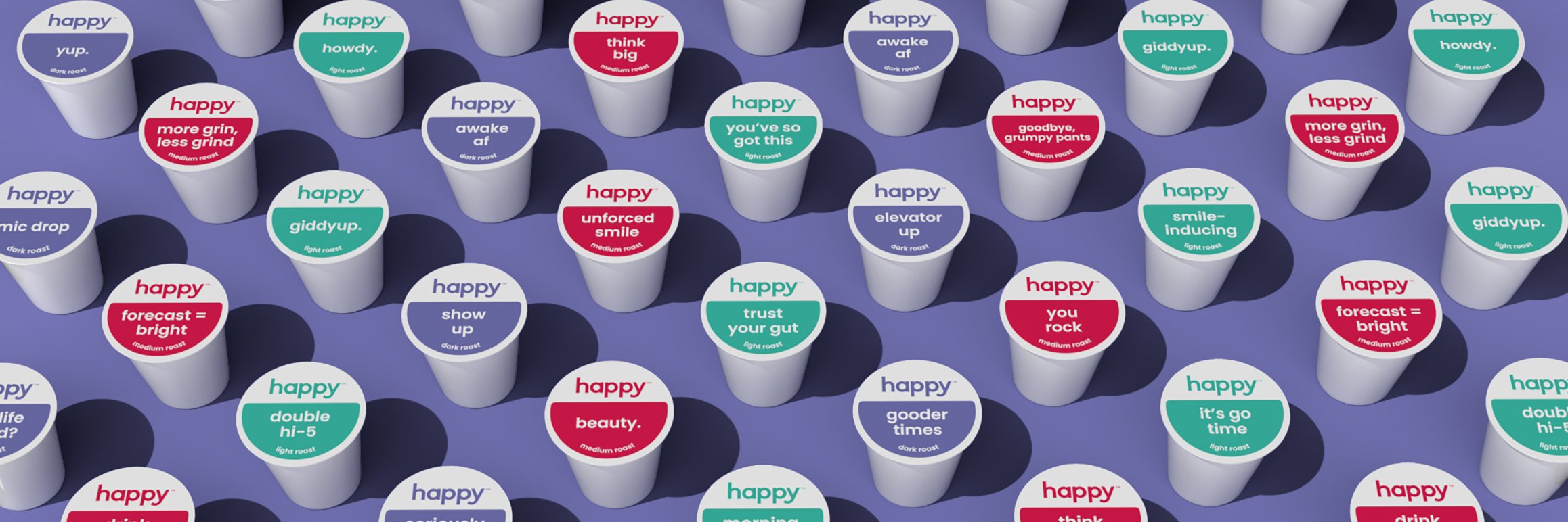 coffee pods lined in a row on a purple background