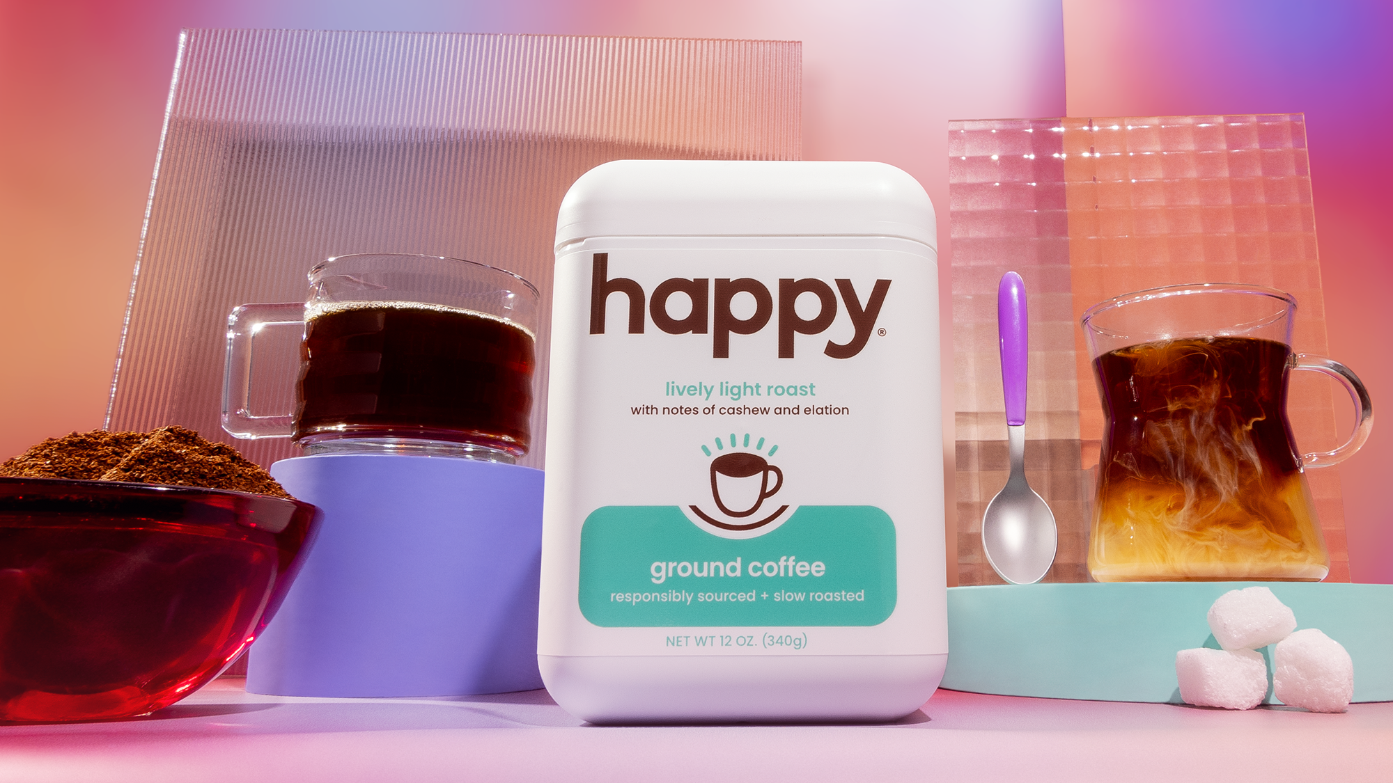 Coffee packaging labeled 'happy' with a cup of coffee and coffee beans on a colorful background