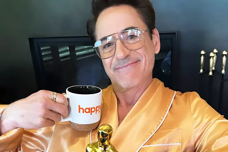 People Article: Robert Downey Jr. Pulls the Ultimate Style Flex by Dressing Up Like His Oscar Statuette: 'Oh Happy Day'