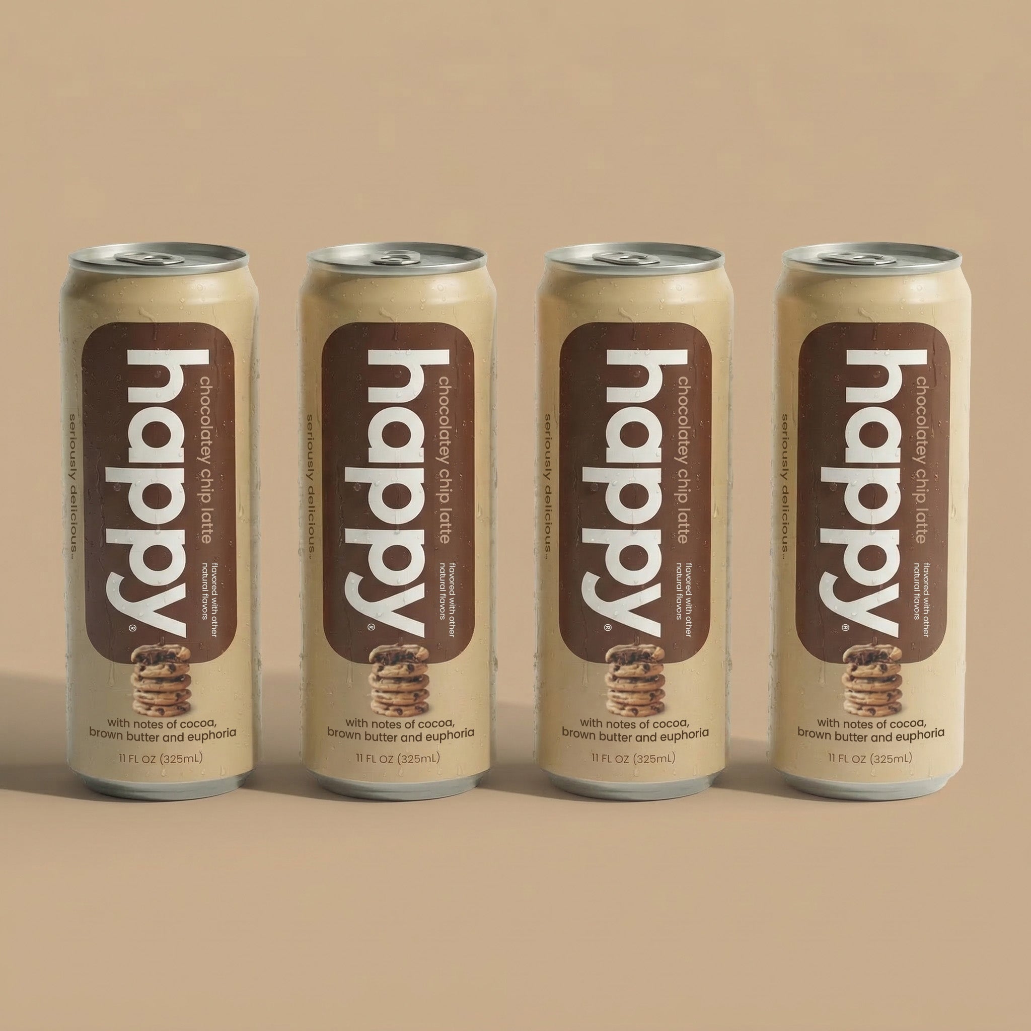 Four cans of 'happy' chocolate chip Latte on a beige background