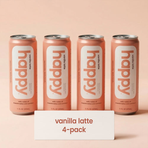 Four cans of 'happy' vanilla latte on a peach background