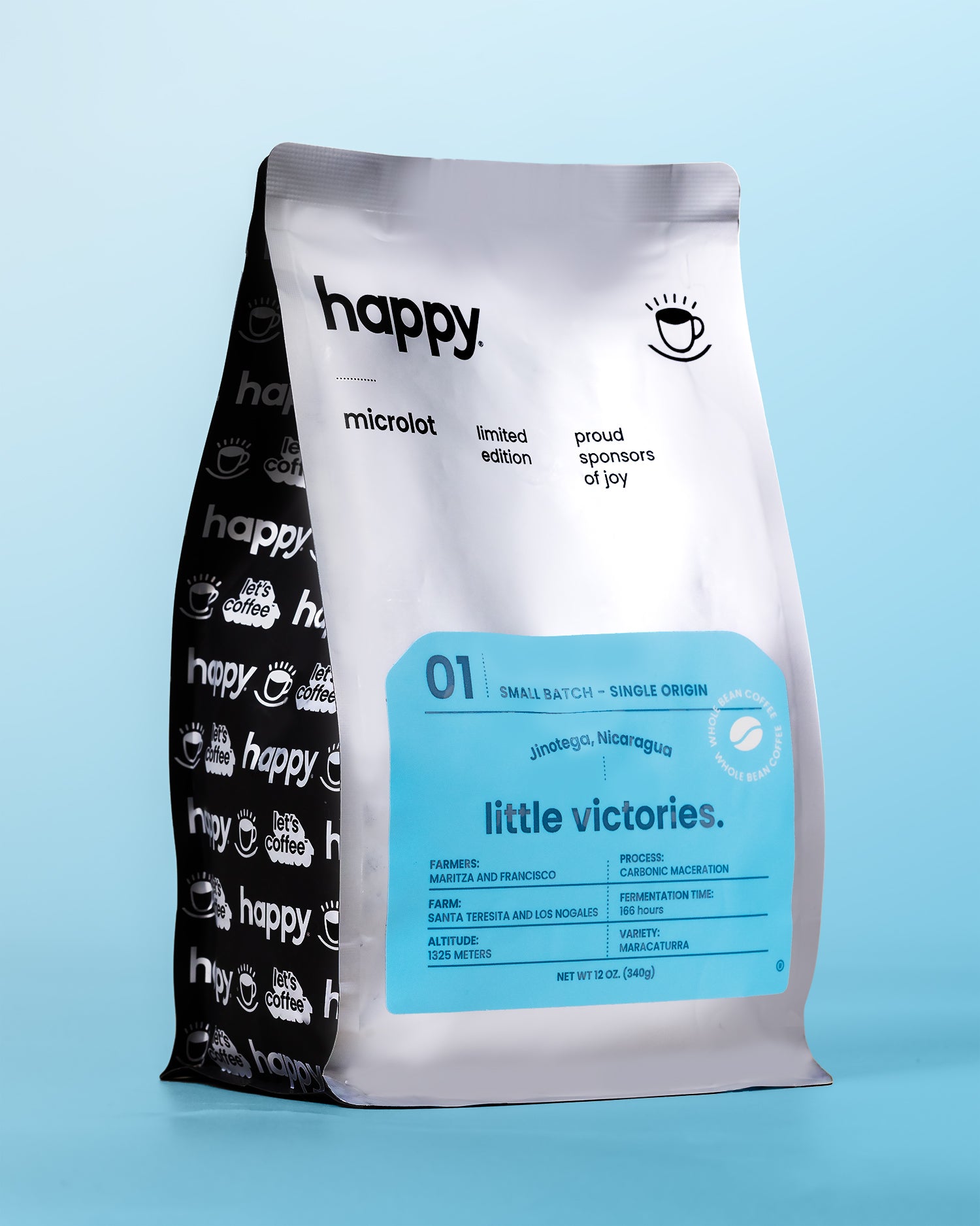 Front of Happy Coffee Microlot - Little Victories Maracaturra Specialty Coffee Beans with a blue background