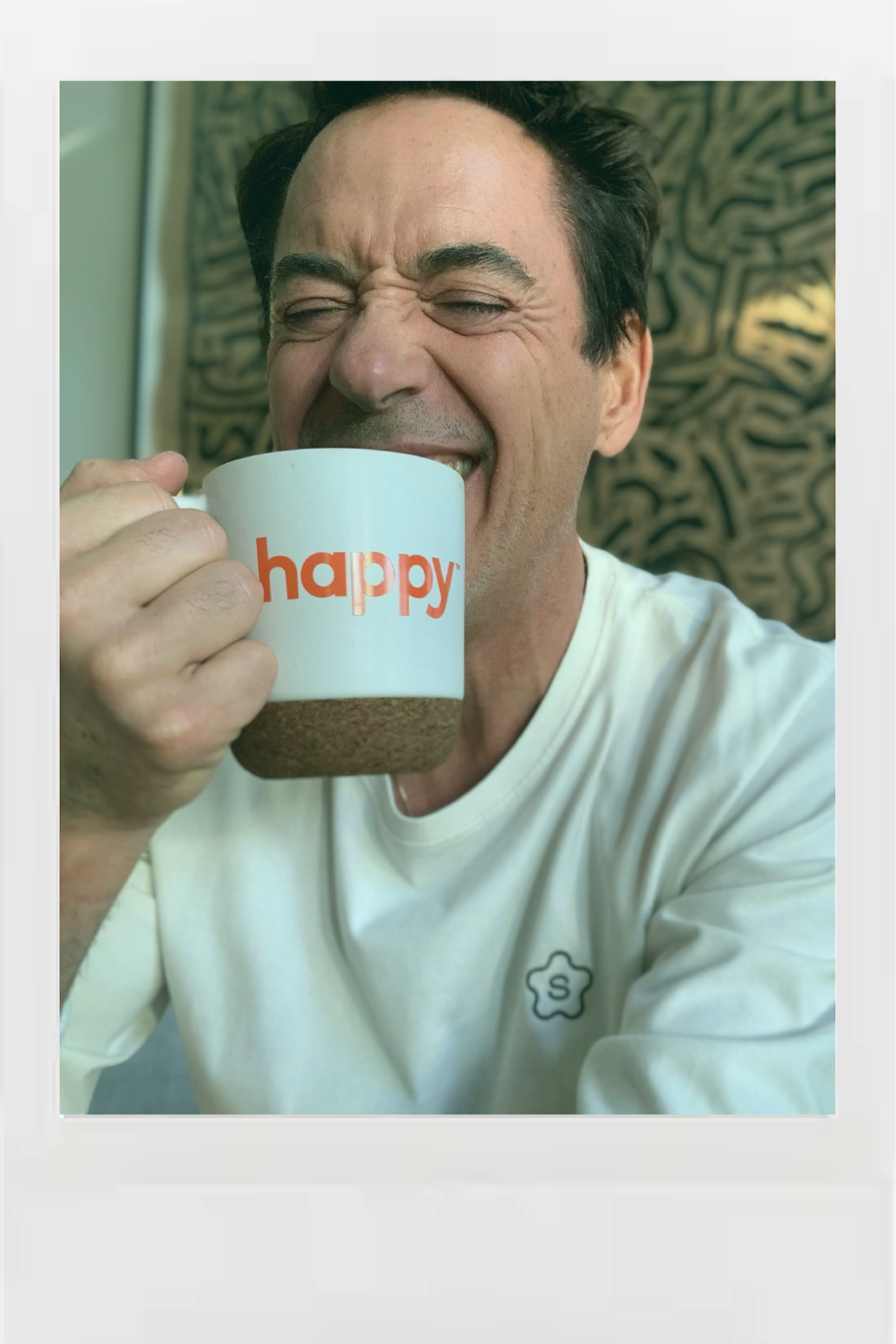 Robert Downey Jr Drinking happy coffee and laughing