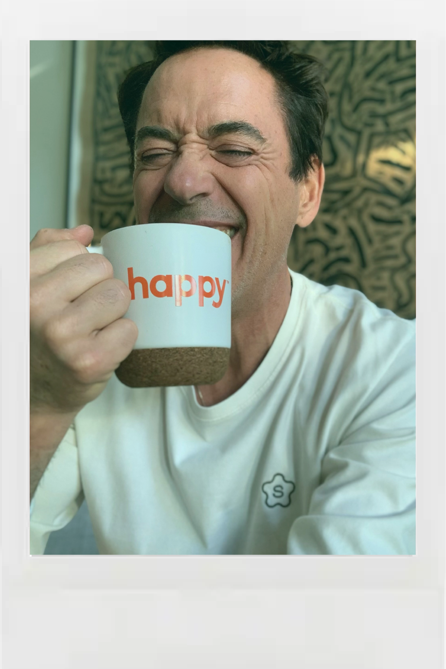 Robert Downey Jr Drinking happy coffee and laughing. Yes, that Robert Downey Jr - is there someone else?  