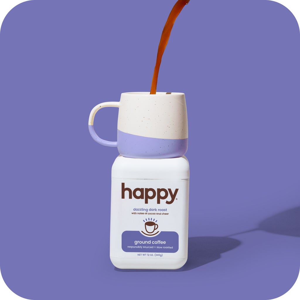 Coffee pouring into a cup - dark roast