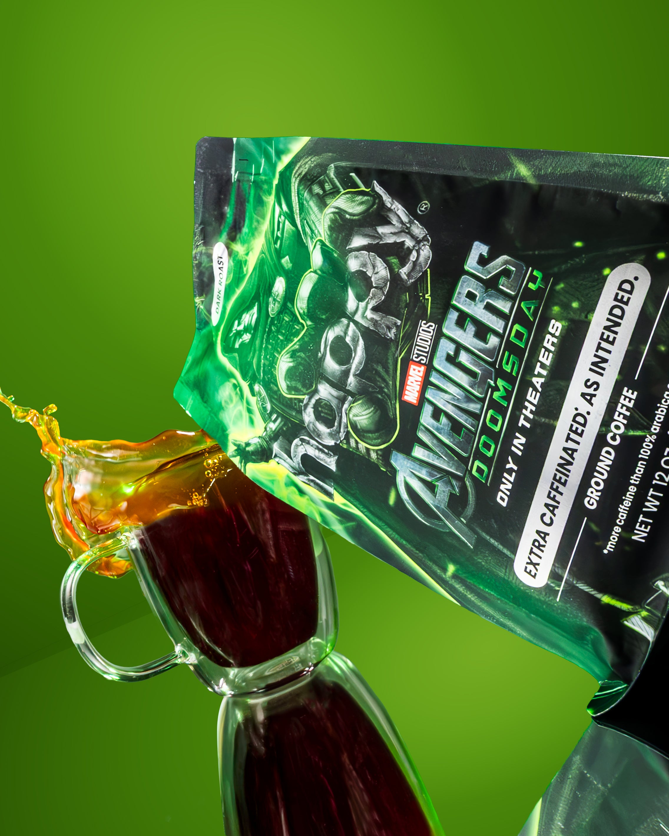 A green and black happy x Avengers: Doctor Doom Extra Caffeinated Coffee tilted over a clear glass mug filled with dark coffee, with a splash of coffee at the edge, on a bright green background.
