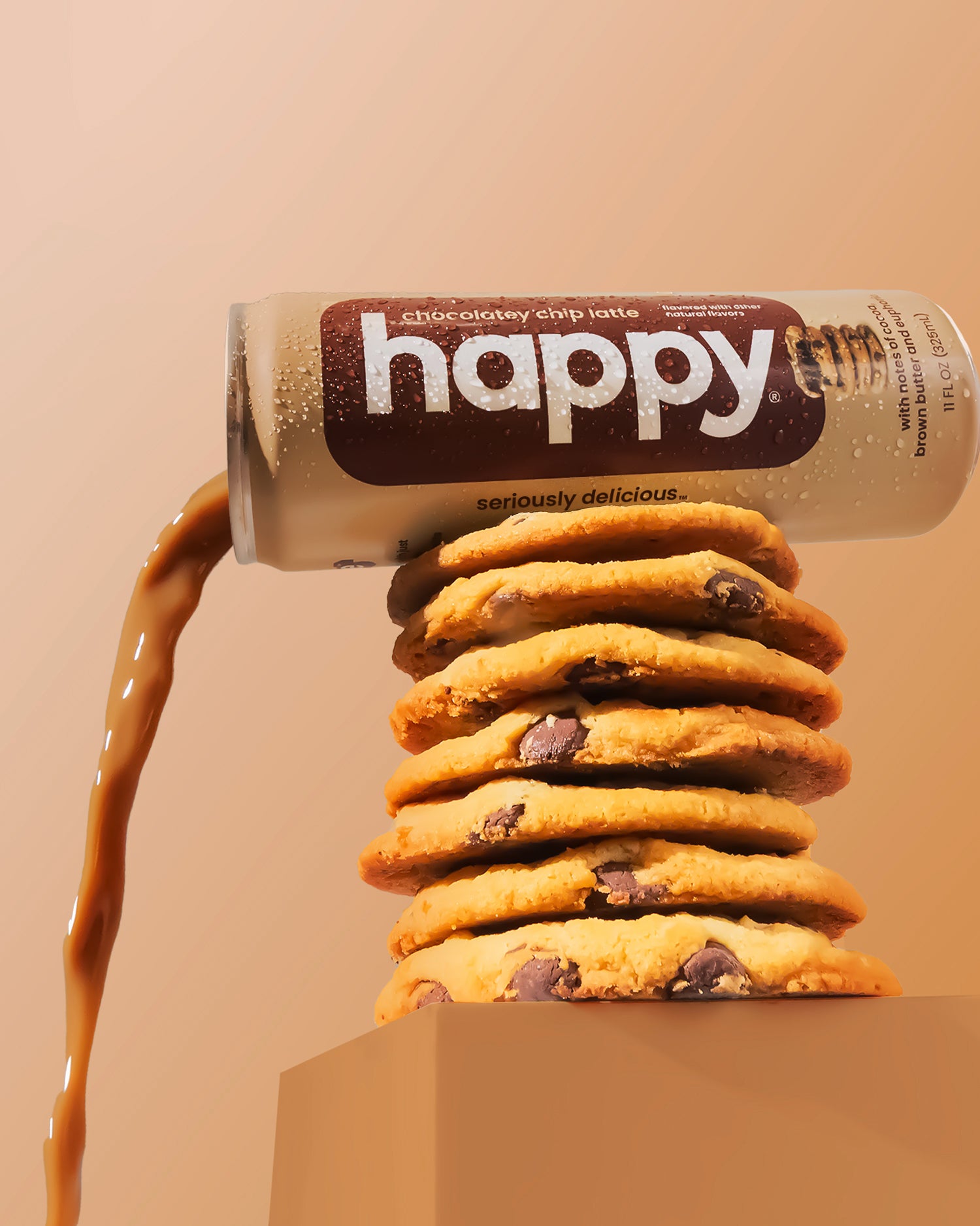 Stack of cookies with a can labeled 'happy' Chocolatey Chip Latte on a beige background