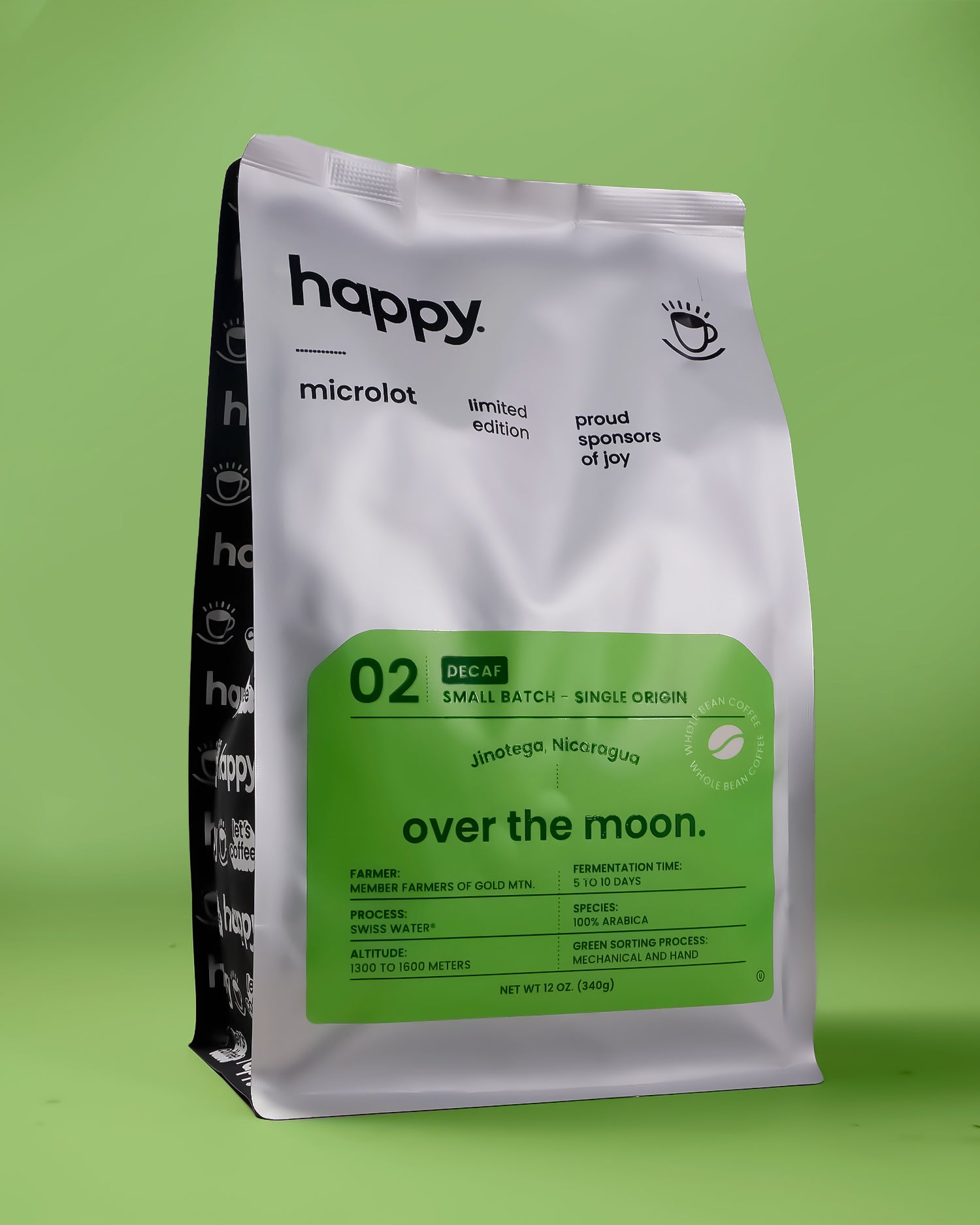 Over the Moon Decaf Coffee bag from happy on a green background