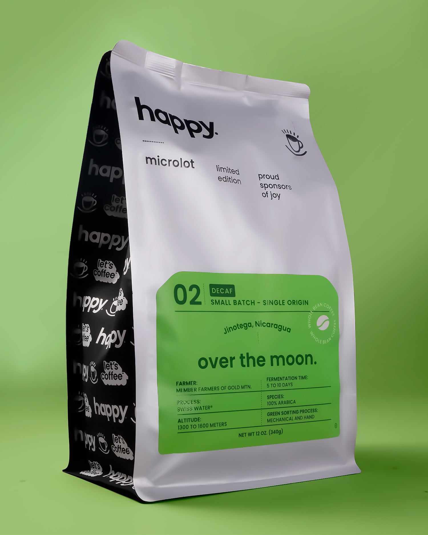 Over the Moon Decaf Coffee bag from happy on a green background