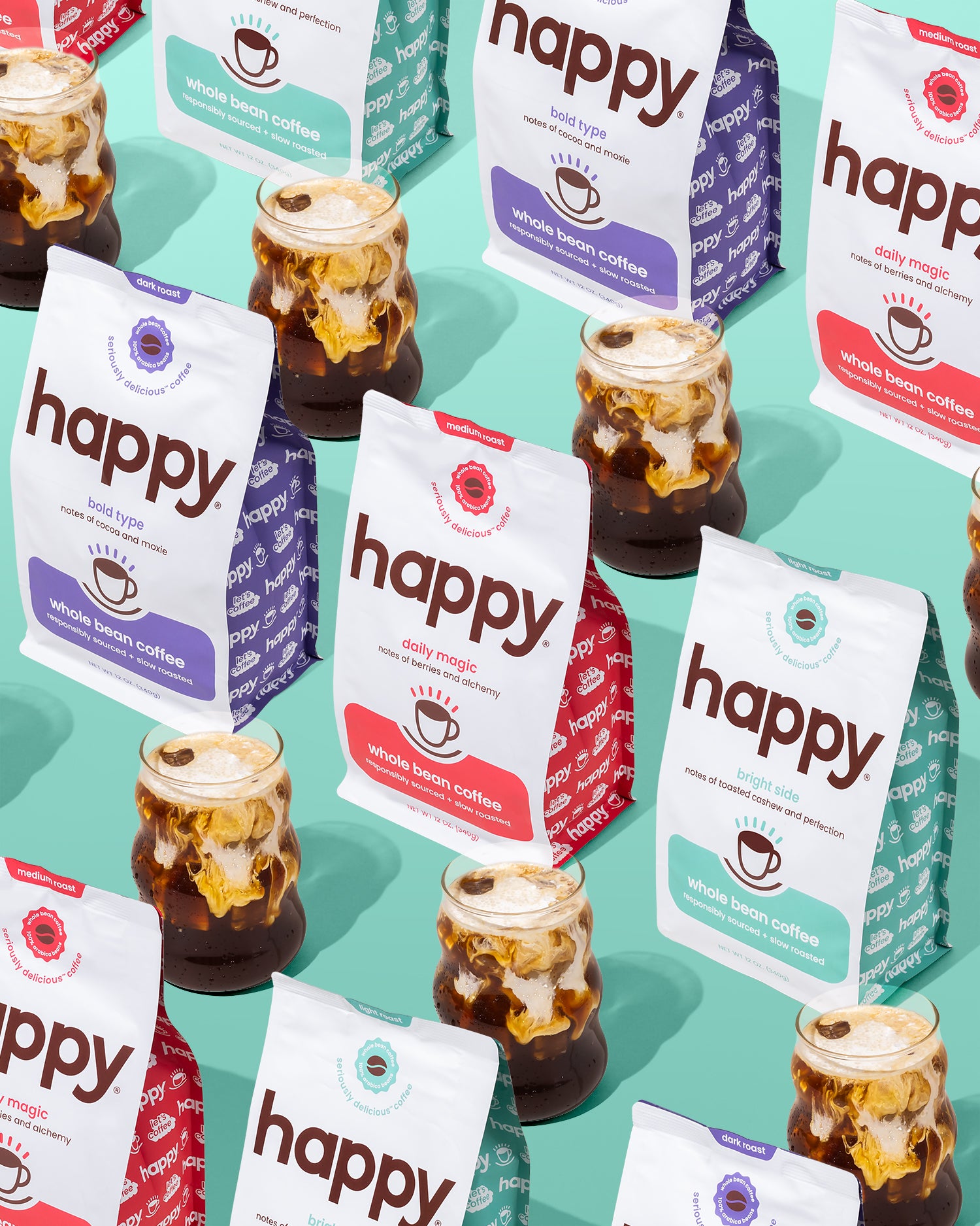 Multiple 'happy' branded coffee packages with jars of iced coffee on a teal background