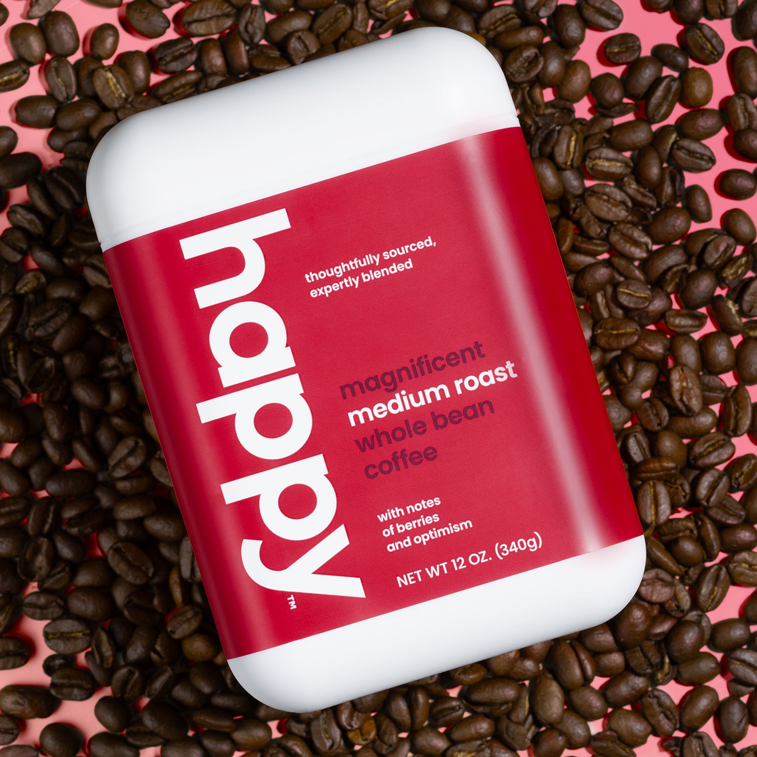magnificent medium roast whole bean on a bed of coffee beans