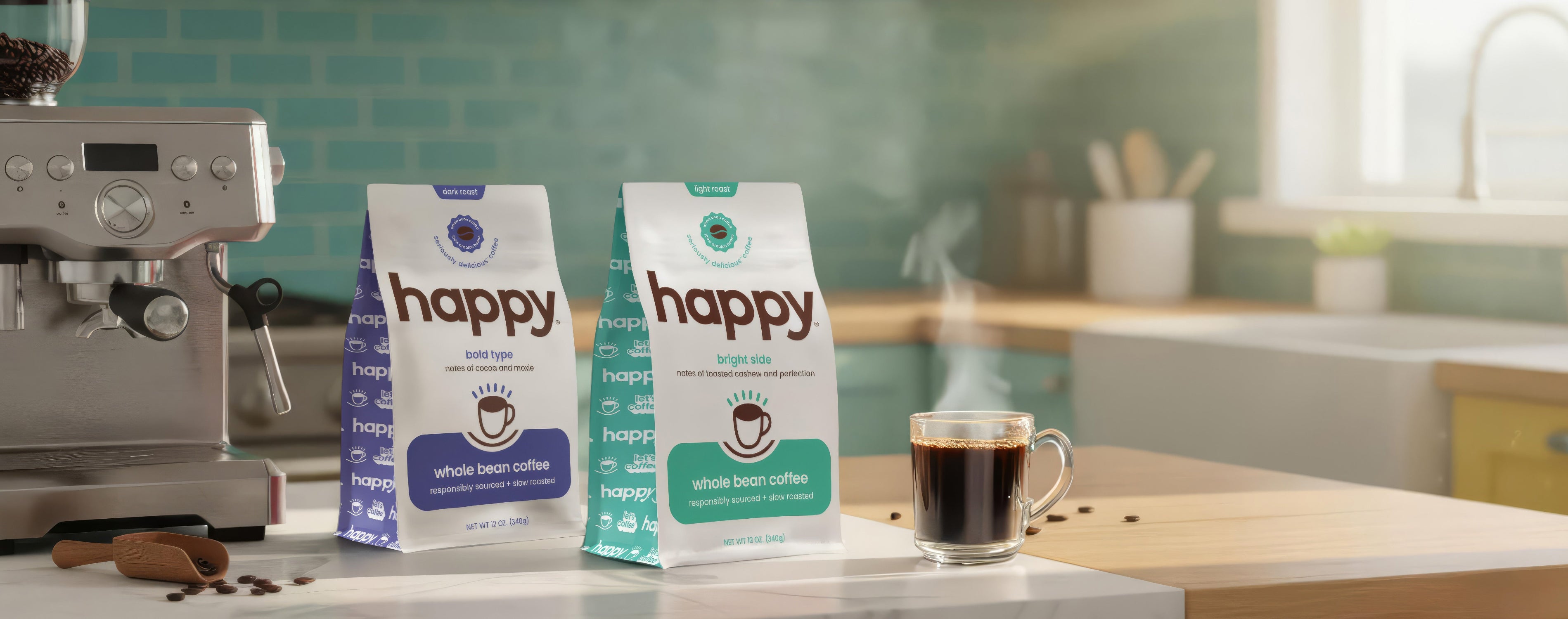 Two 'happy' whole bean coffee bags on a kitchen counter with a cup of coffee and espresso machine.