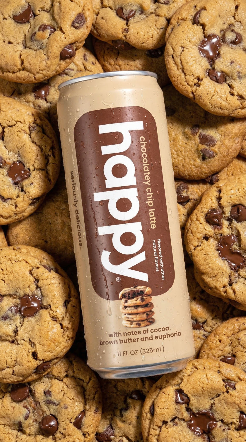 Can of 'happy' chocolatey chip latte surrounded by chocolate chip cookies