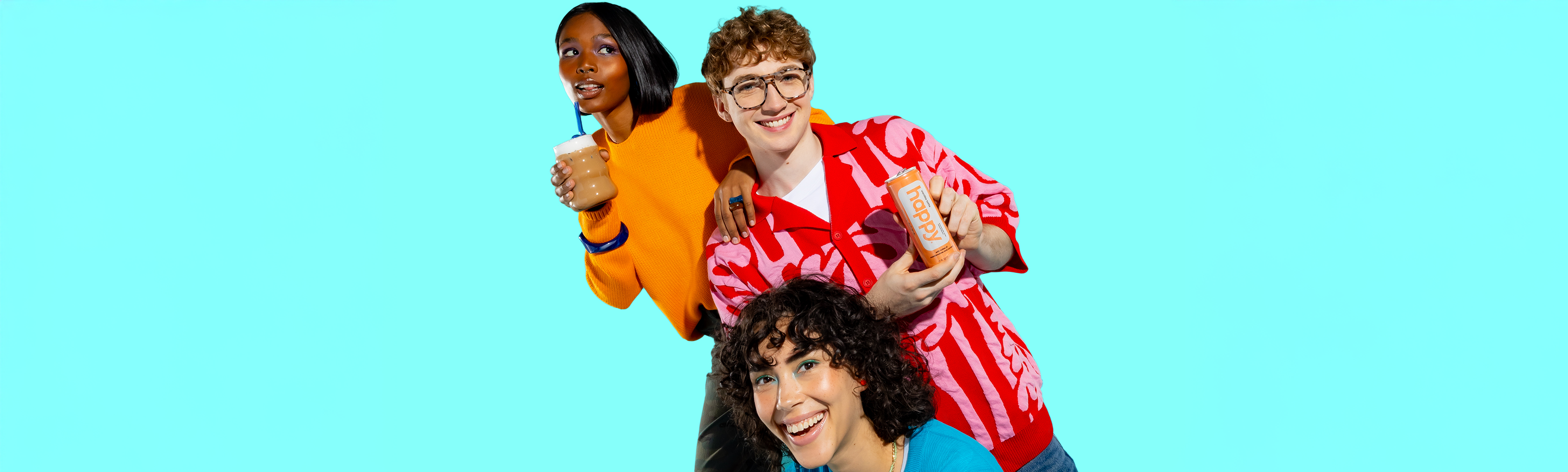 three people holding some coffee