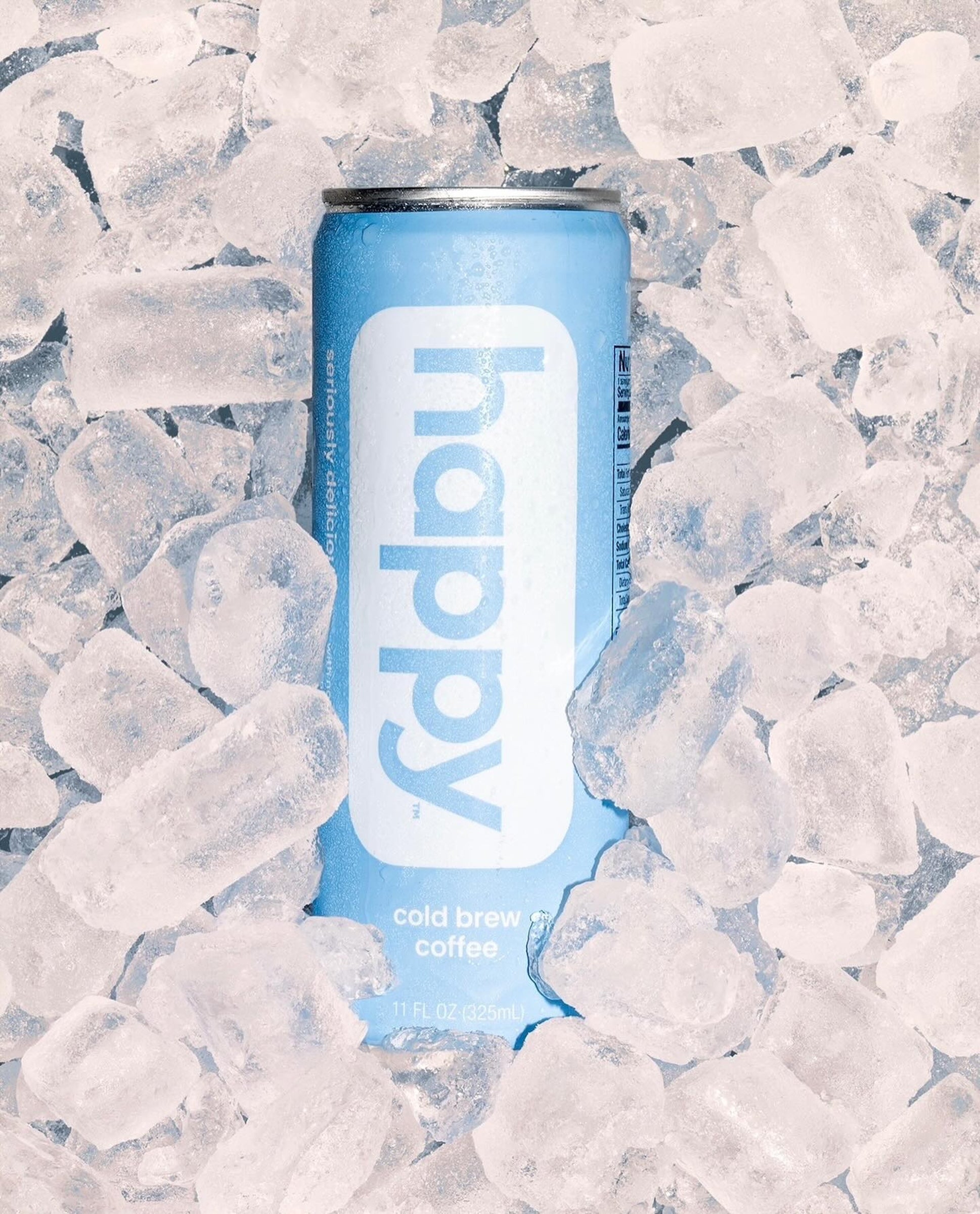 Can of 'happy' cold brew coffee surrounded by ice cubes