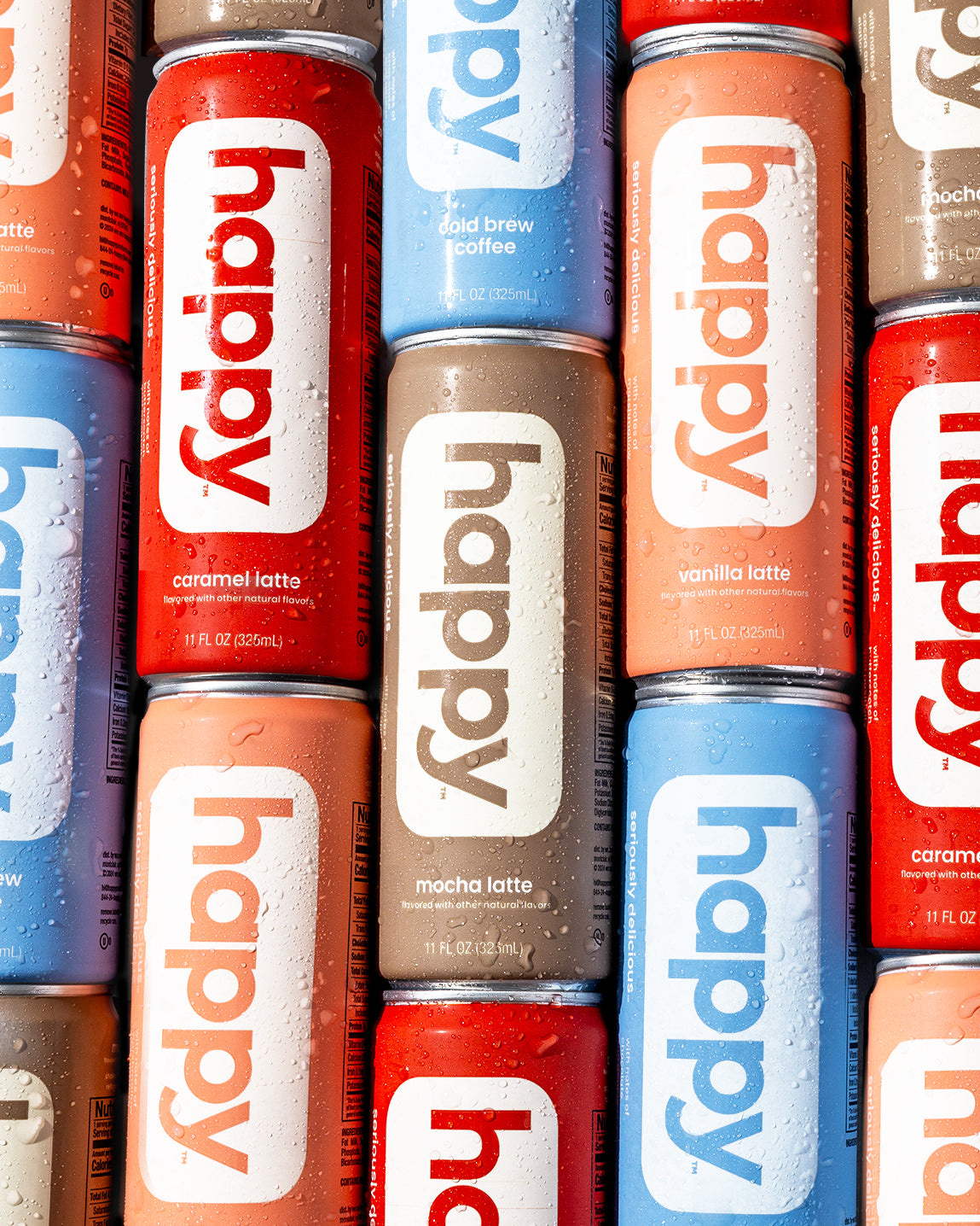 Cans of Happy Cold Brew, Happy Mocha Latte, Happy Vanilla Latte, and Happy Caramel Latte